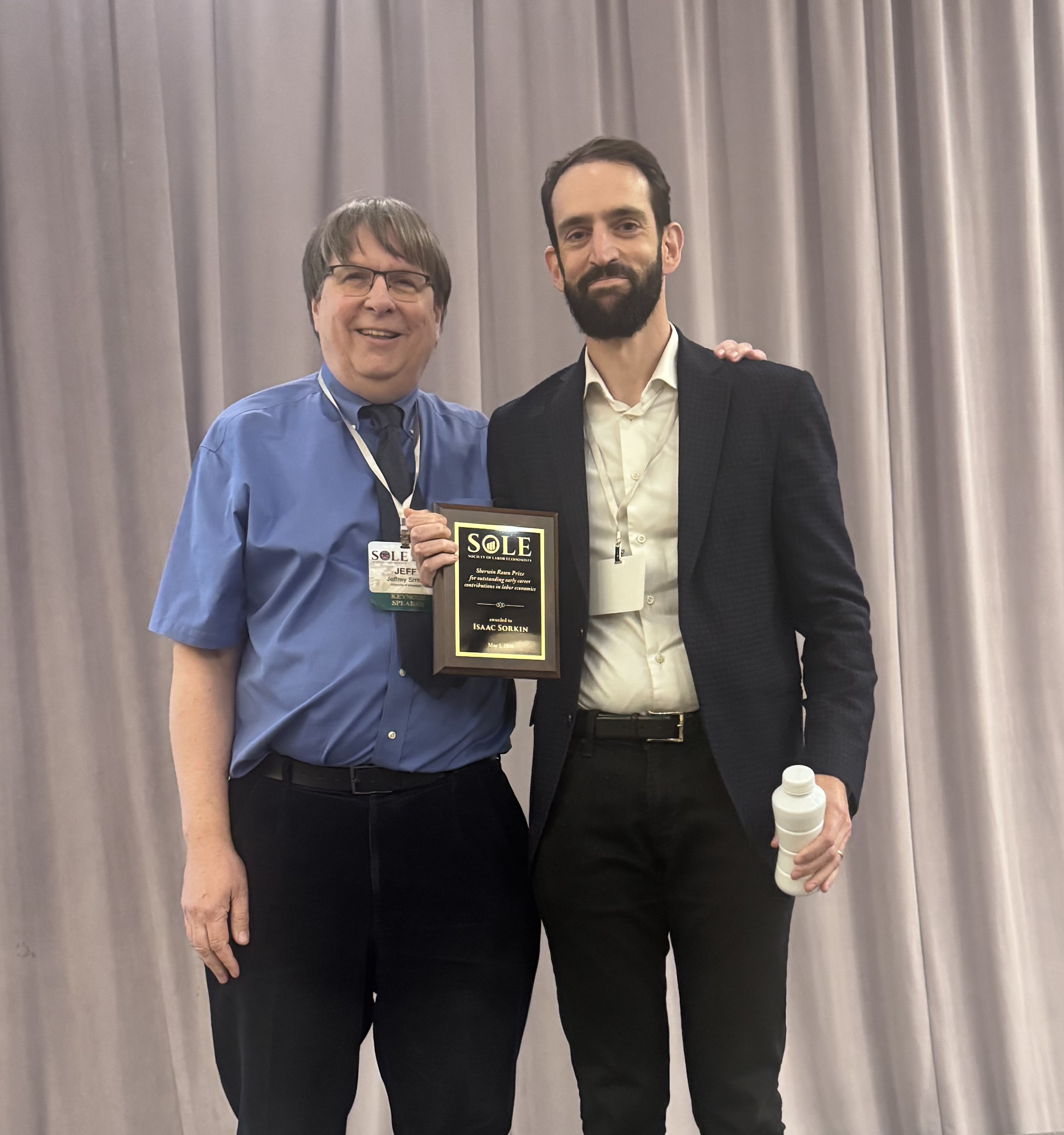 Jeff Smith presents the Rosen Prize to Isaac Sorkin in Denver at SOLE2026