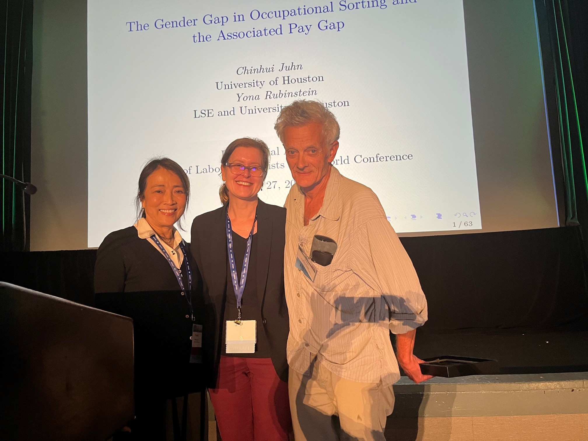 Chinhui Juhn presents Mincer Award to John Bound